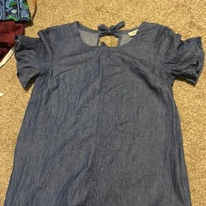 Longer top size small. Not long enough for me to wear as a dress